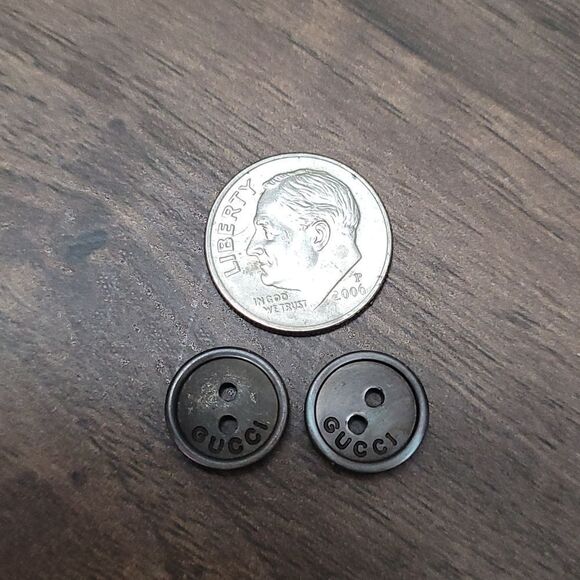 GUCCI Set of Two 2-Hole Bronze Iridescent Buttons Engraved w/ 'GUCCI' - Picture 3 of 4